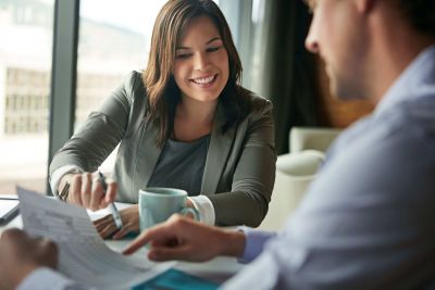 Female accountant talking through finances with client